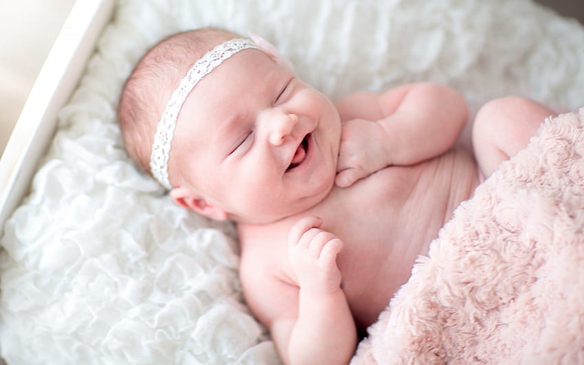 newborn first smile baby edge