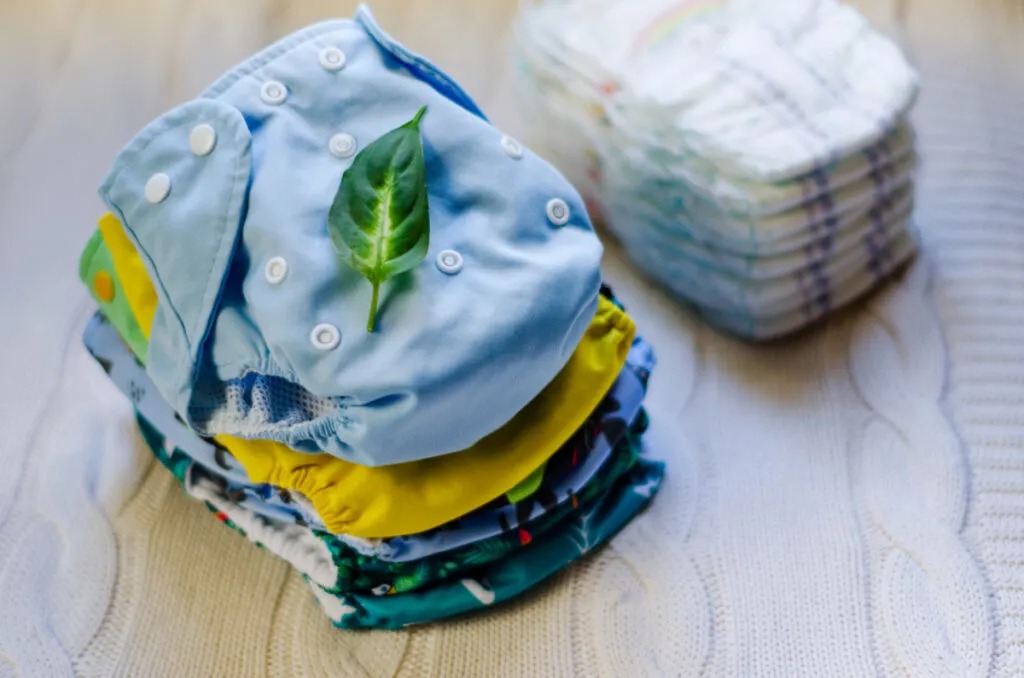 pros and cons of cloth diapering baby edge