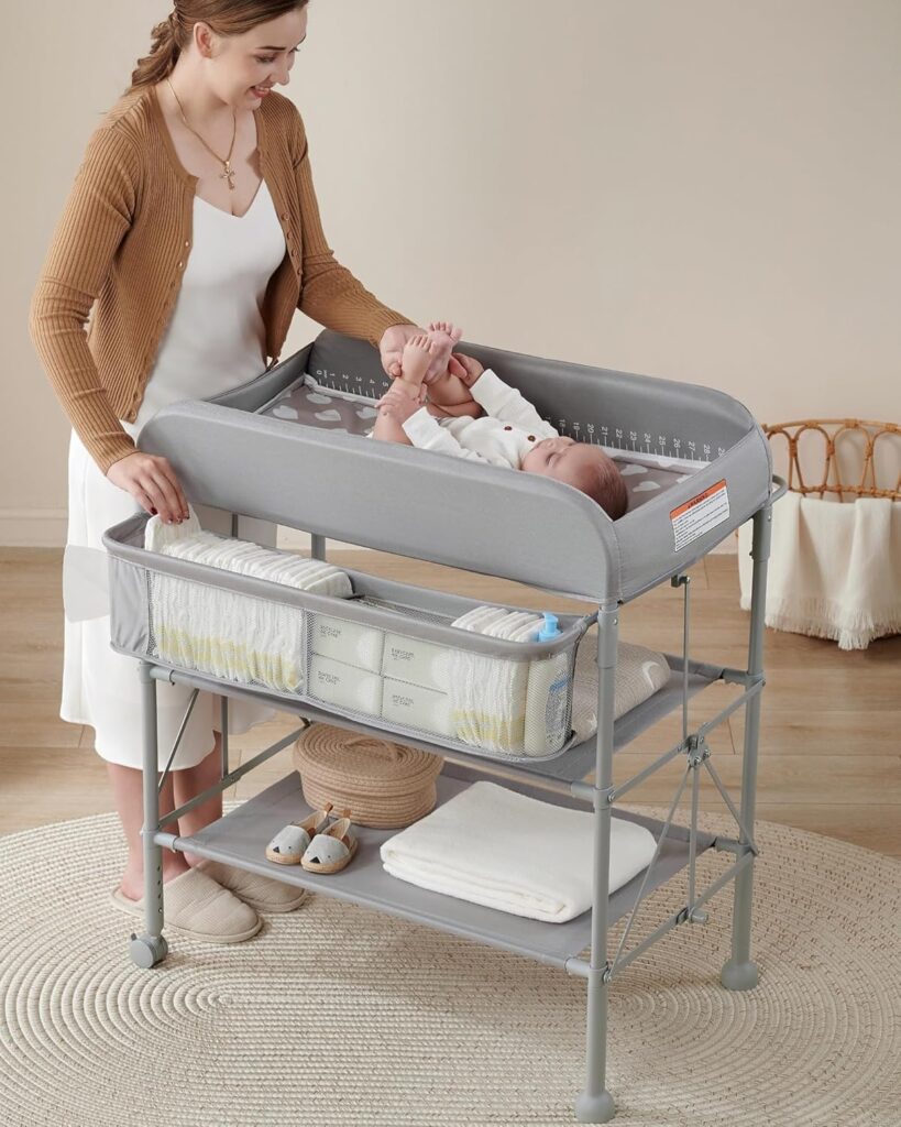 Best Portable Baby Changing Tables (Comparison Guide) beka height adjustable portable diaper changing station light grey with organizer shelves.